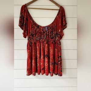 Women's Free People Size Large Bohemian Style with a capped sleeve top